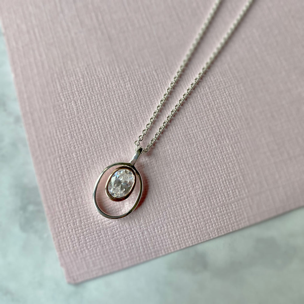 Silver Oval Cubic Zirconia Pendant with Rose Gold Accent