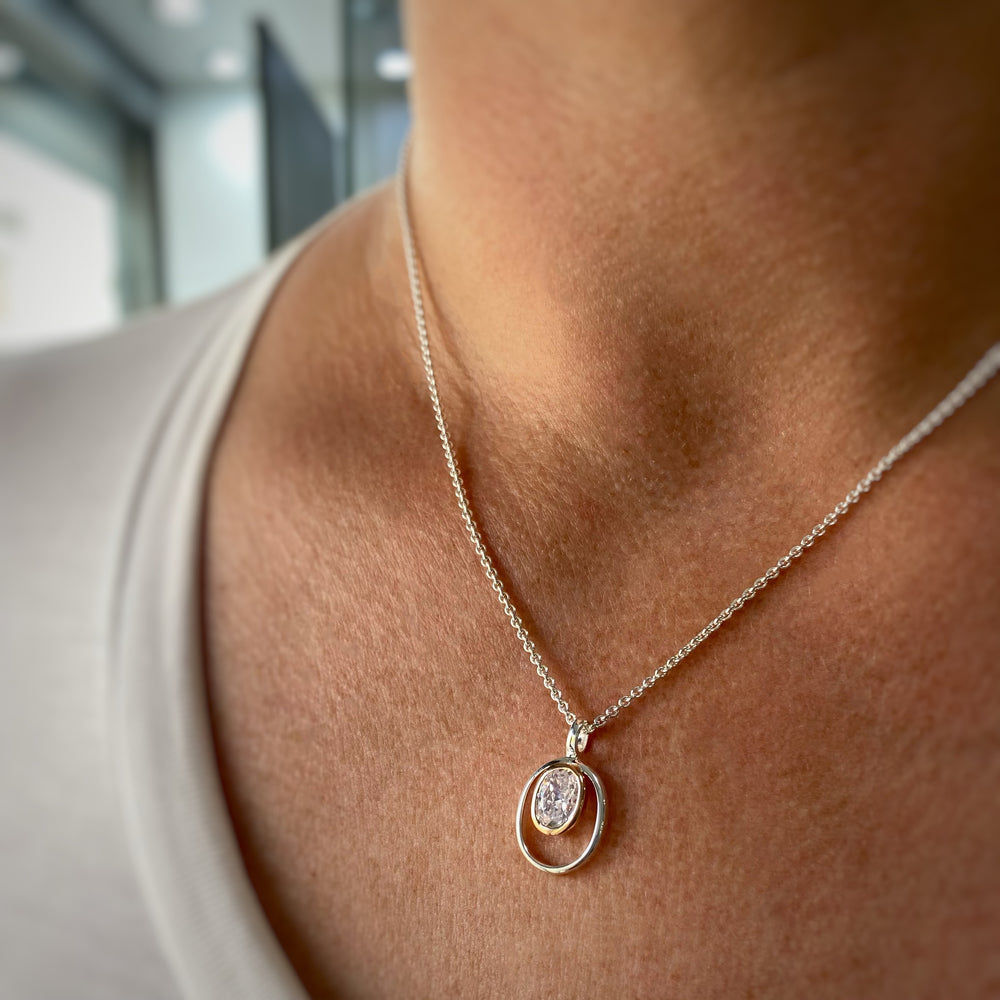 Silver Oval Cubic Zirconia Pendant with Rose Gold Accent