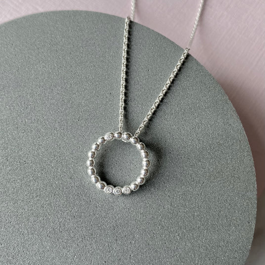 Silver Open Beaded Circle Pendant With Cubic Zirconia's