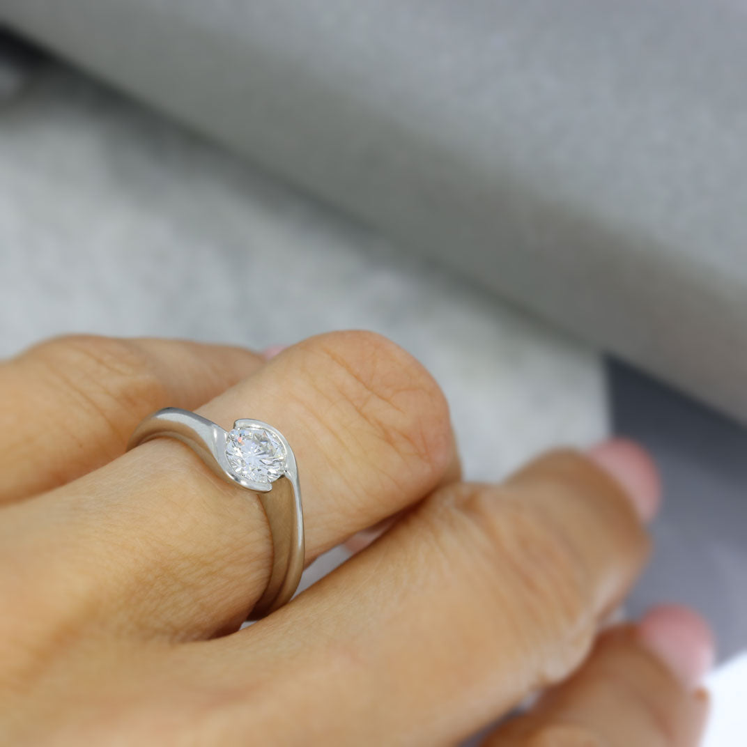 Pre Owned Platinum Certified Diamond Solitaire Ring in a Crossover Setting 0.70ct F VVS