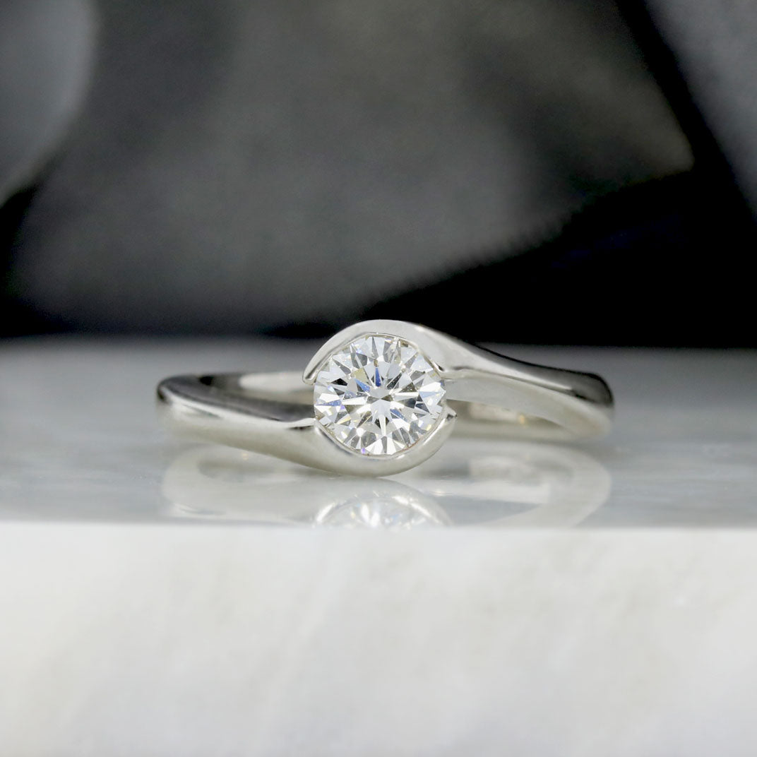 Pre Owned Platinum Certified Diamond Solitaire Ring in a Crossover Setting 0.70ct F VVS