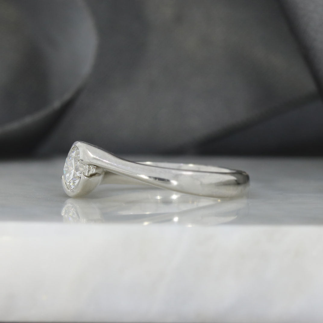 Pre Owned Platinum Certified Diamond Solitaire Ring in a Crossover Setting 0.70ct F VVS