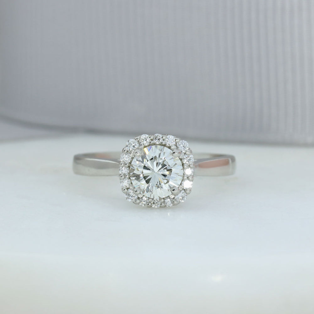 Pre Owned Certified Platinum Solitaire Diamond Ring with Halo Surround Total 1.13ct J VVS2