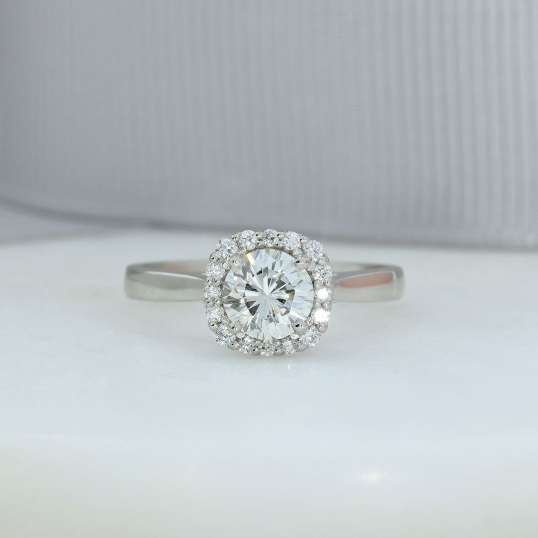Pre Owned Certified Platinum Solitaire Diamond Ring with Halo Surround Total 1.13ct J VVS2
