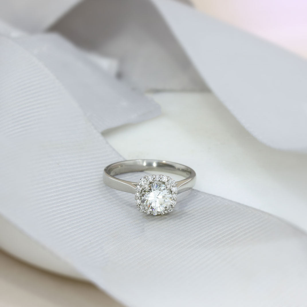 Pre Owned Certified Platinum Solitaire Diamond Ring with Halo Surround Total 1.13ct J VVS2