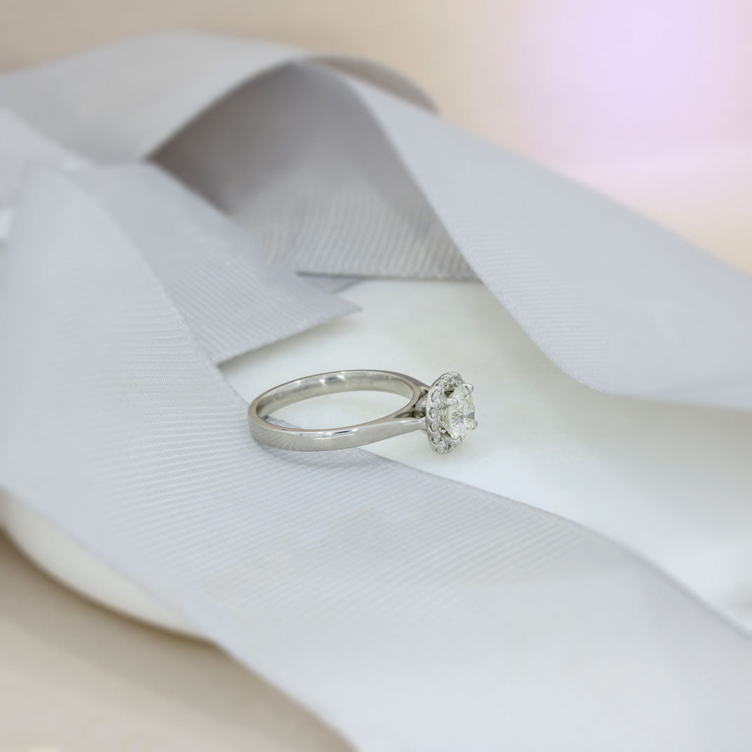 Pre Owned Certified Platinum Solitaire Diamond Ring with Halo Surround Total 1.13ct J VVS2