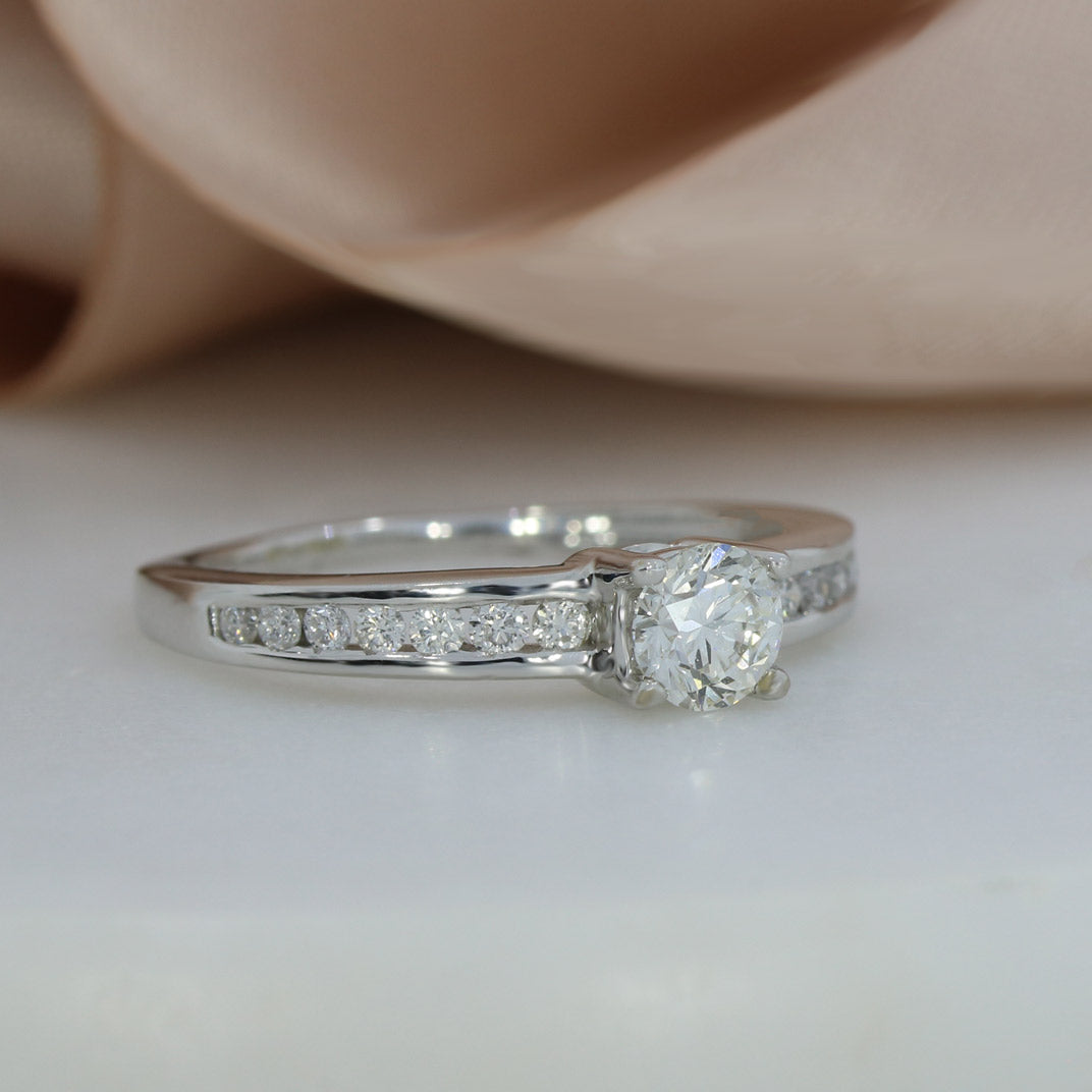 Pre Owned 18ct White Gold Diamond Solitaire Ring with Channel Diamond Shoulders 0.74ct