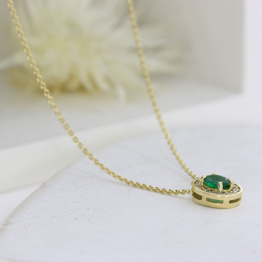 18ct Gold Oval Emerald & Diamond Halo Pendant on a 9ct Yellow Gold Chain