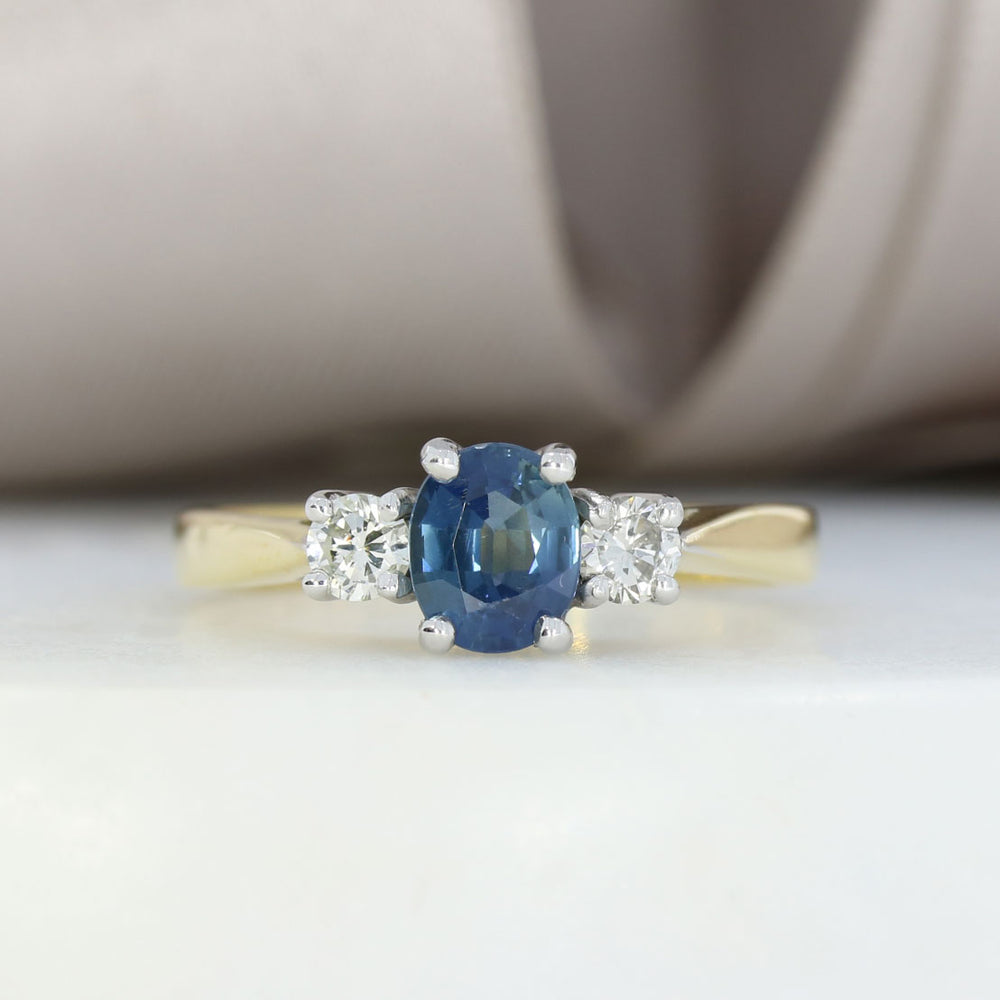 18ct Gold Oval Claw Set Sapphire & Round Diamond 3 Stone Ring