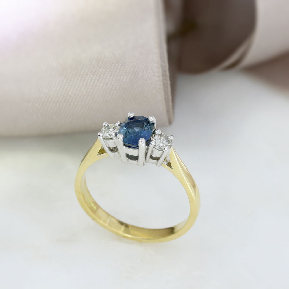 18ct Gold Oval Claw Set Sapphire & Round Diamond 3 Stone Ring