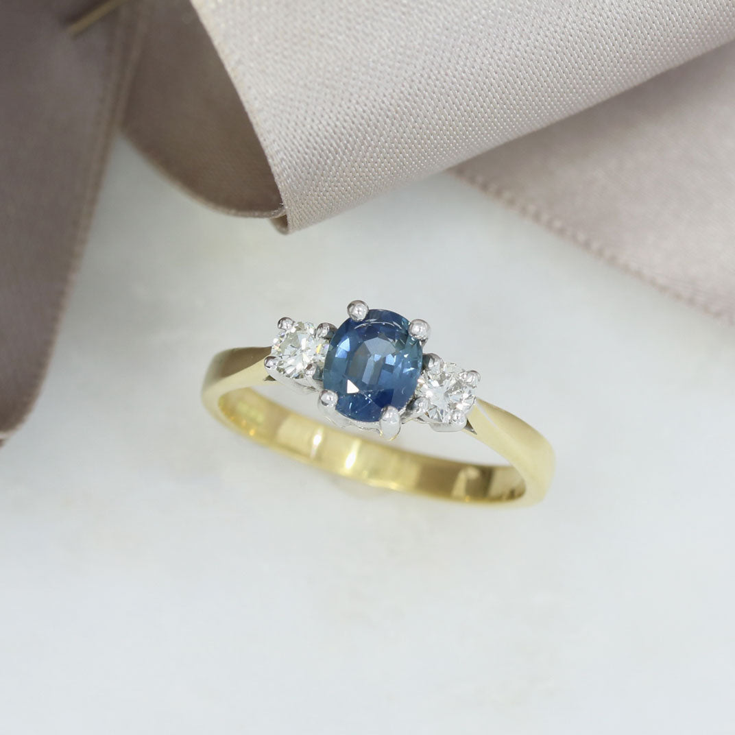 18ct Gold Oval Claw Set Sapphire & Round Diamond 3 Stone Ring