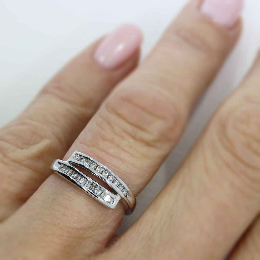 Pre Owned 18ct White Gold Crossover Baguette & Round Diamond Dress Ring 0.25ct