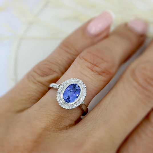 Pre Owned Platinum Oval Tanzanite & Diamond Cluster Ring