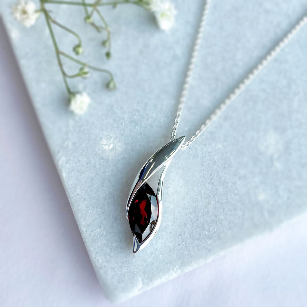 Silver Pendant With Large Trap Set Marquise Shaped Garnet Stone