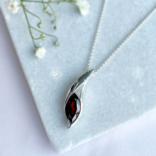 Silver Pendant With Large Trap Set Marquise Shaped Garnet Stone