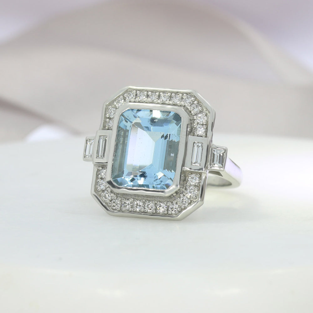 Aquamarine Dress Ring with Pave Set Diamond Halo Surround & Baguette Diamond Shoulders
