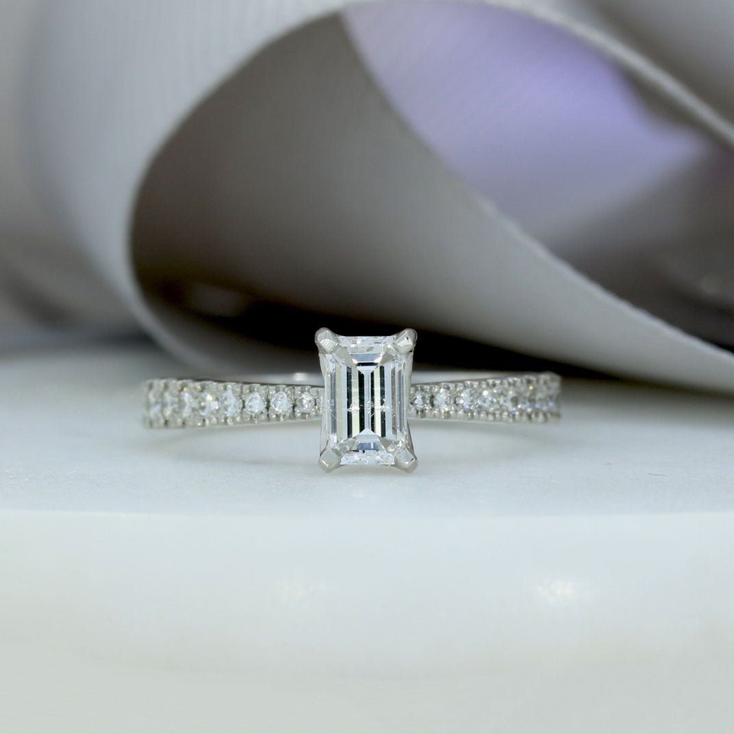 Platinum Certified Emerald Cut Diamond Solitaire Ring Pave Set Diamond Shoulders Total 0.77ct