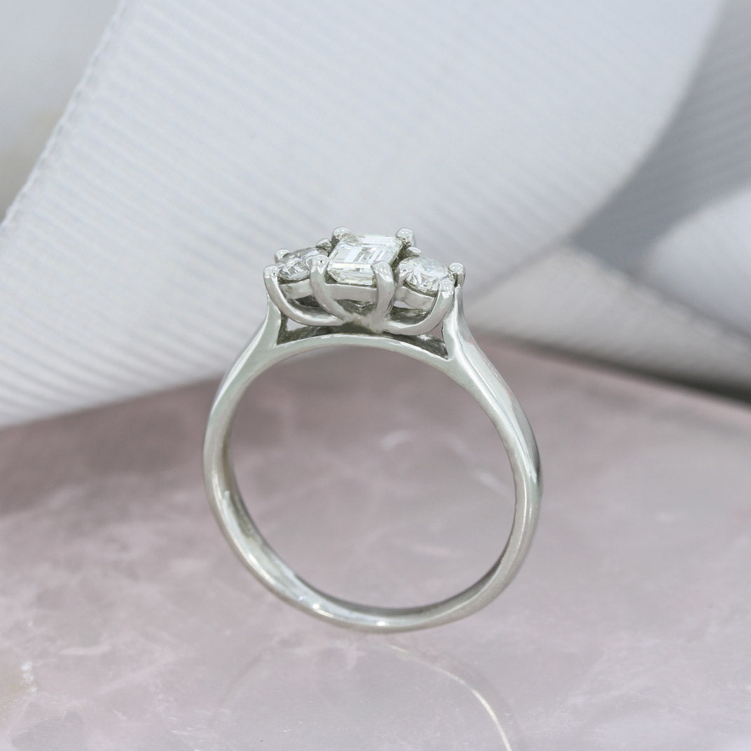 Pre Owned Platinum Emerald & Round Cut 3 Stone Diamond Ring