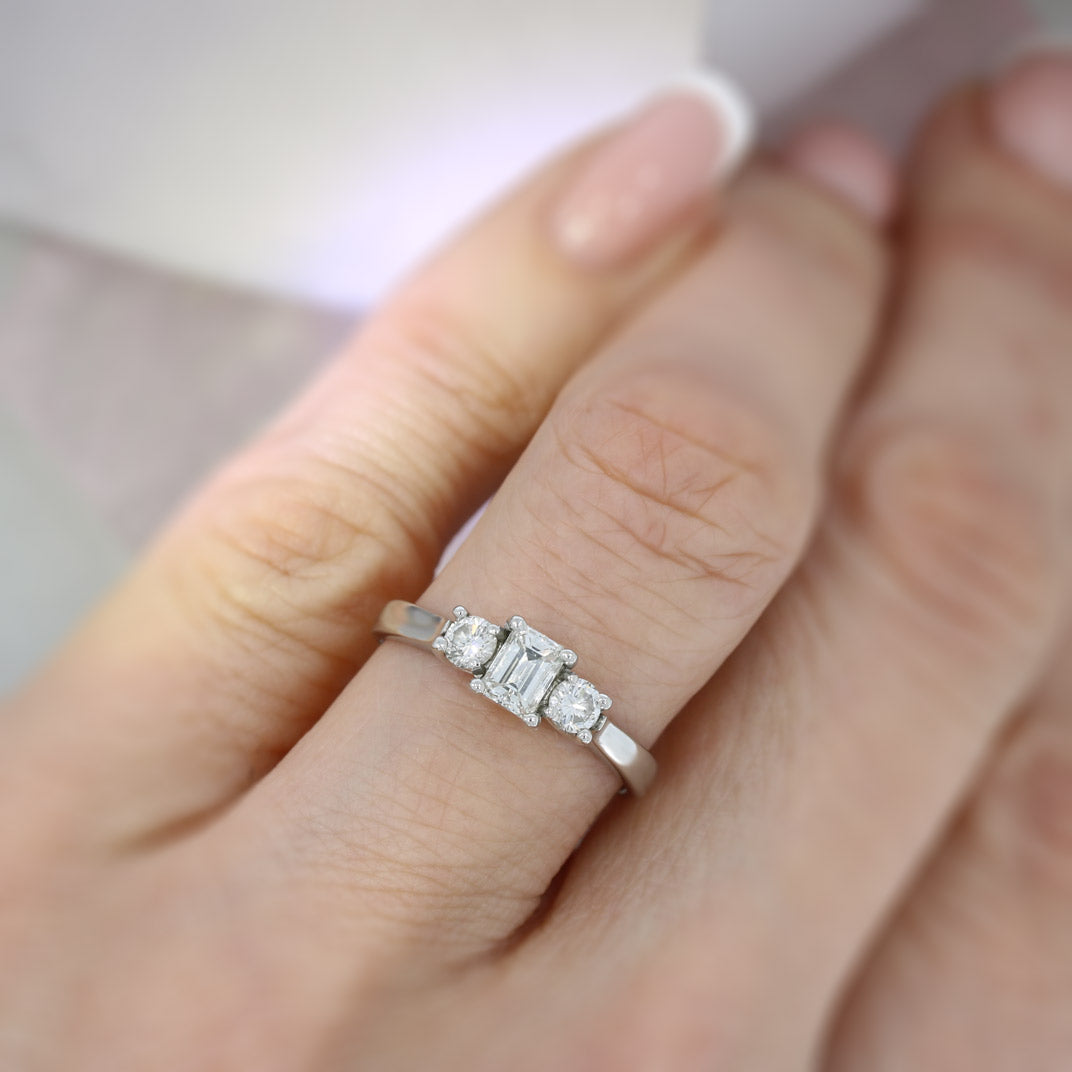 Pre Owned Platinum Emerald & Round Cut 3 Stone Diamond Ring