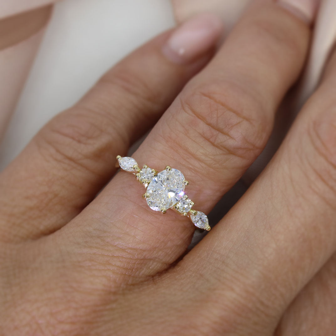 18ct Gold 1ct Oval Lab Grown Diamond Solitaire with Round & Marquise Diamonds on either side