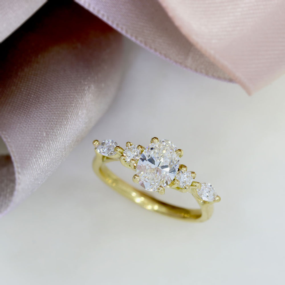 18ct Gold 1ct Oval Lab Grown Diamond Solitaire with Round & Marquise Diamonds on either side