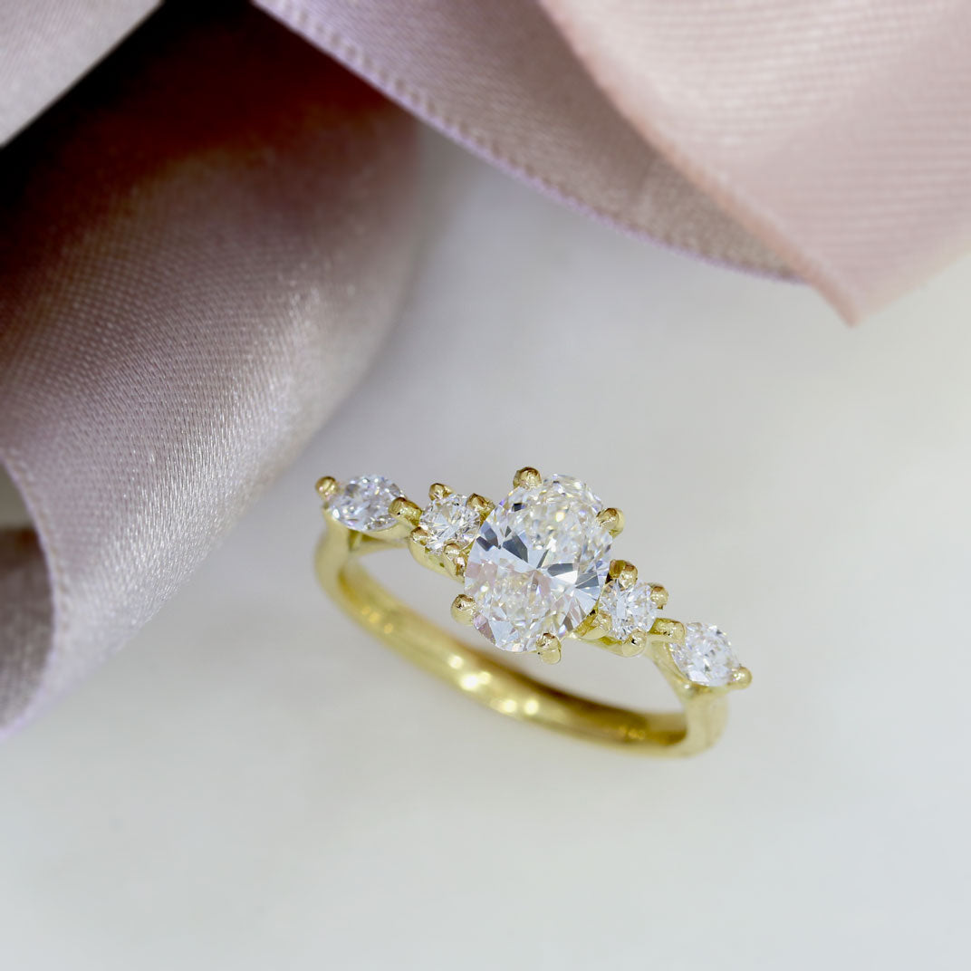 18ct Gold 1ct Oval Lab Grown Diamond Solitaire with Round & Marquise Diamonds on either side