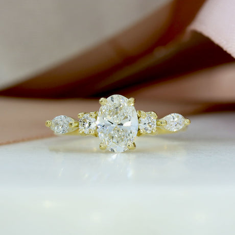 18ct Gold 1ct Oval Lab Grown Diamond Solitaire with Round & Marquise Diamonds on either side