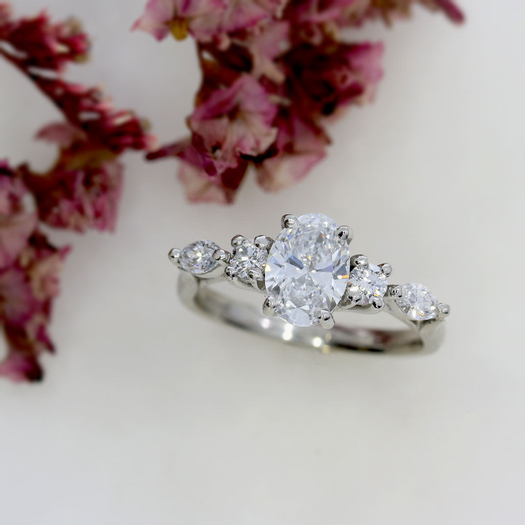 Platinum 1ct Oval Lab Grown Diamond Solitaire with Round & Marquise Diamonds on either side