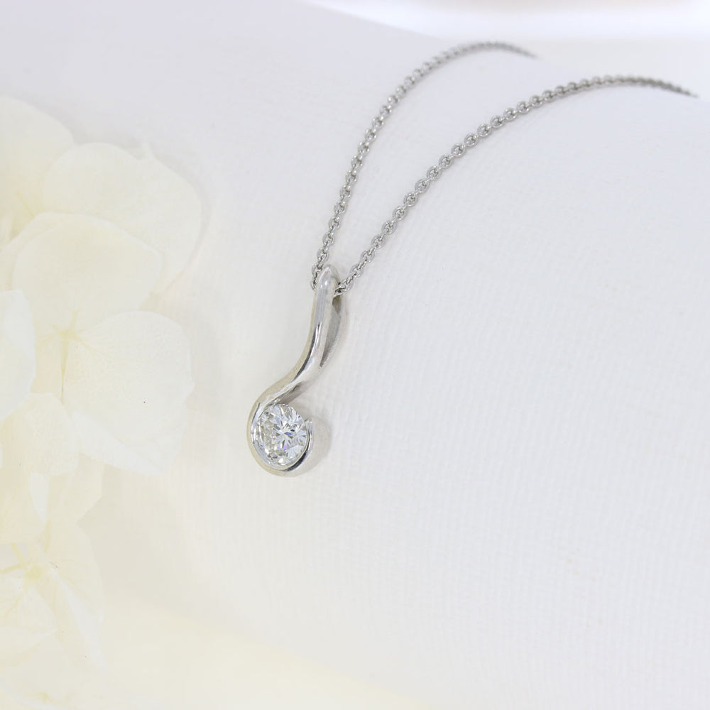9ct White Gold Swirl Pendant with a Single Round Lab Grown Diamond 0.50ct on a 9ct 18" Chain