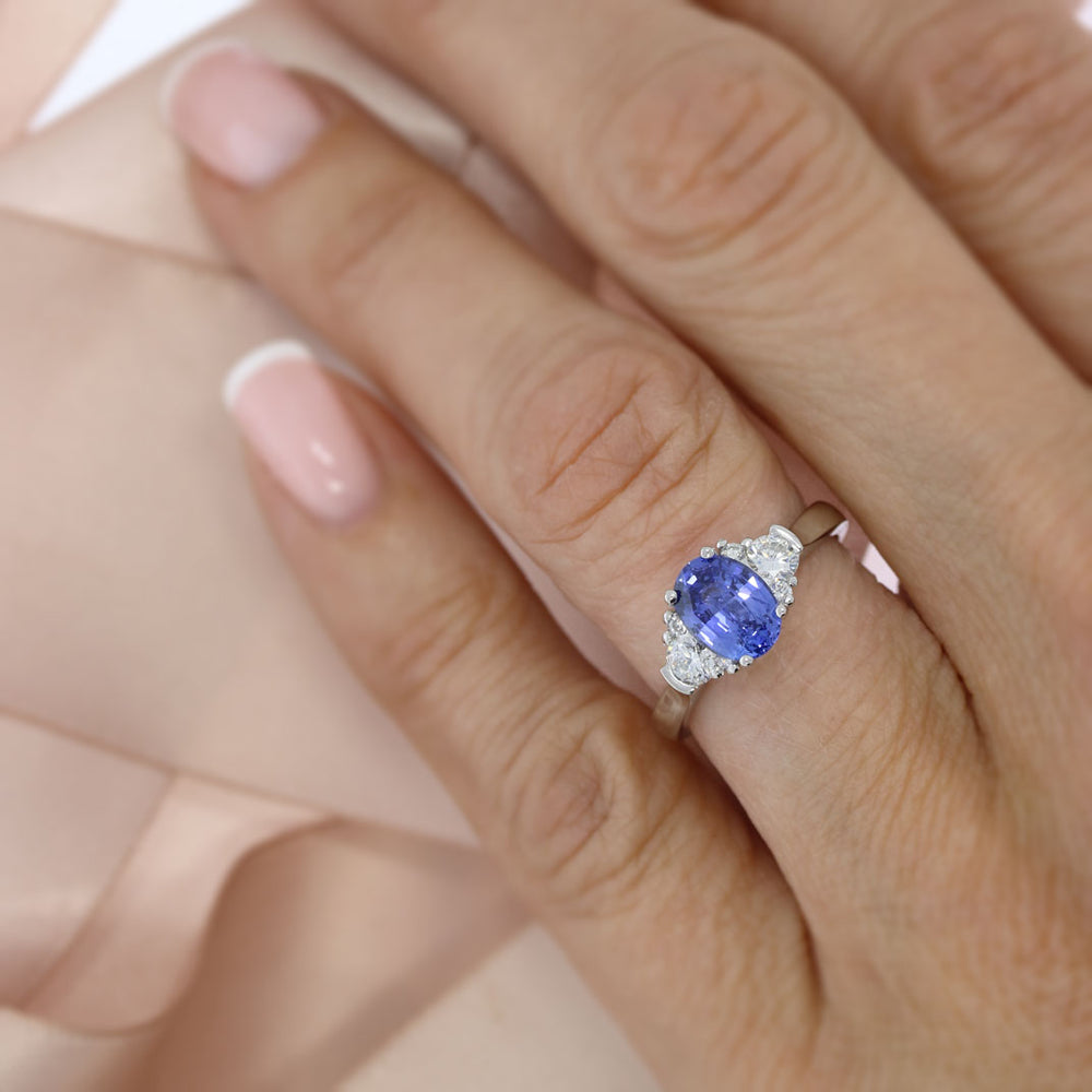 Platinum Oval Sapphire & Diamond Claw Set Ring Sapphire: 1.60ct Diamond: 0.38ct