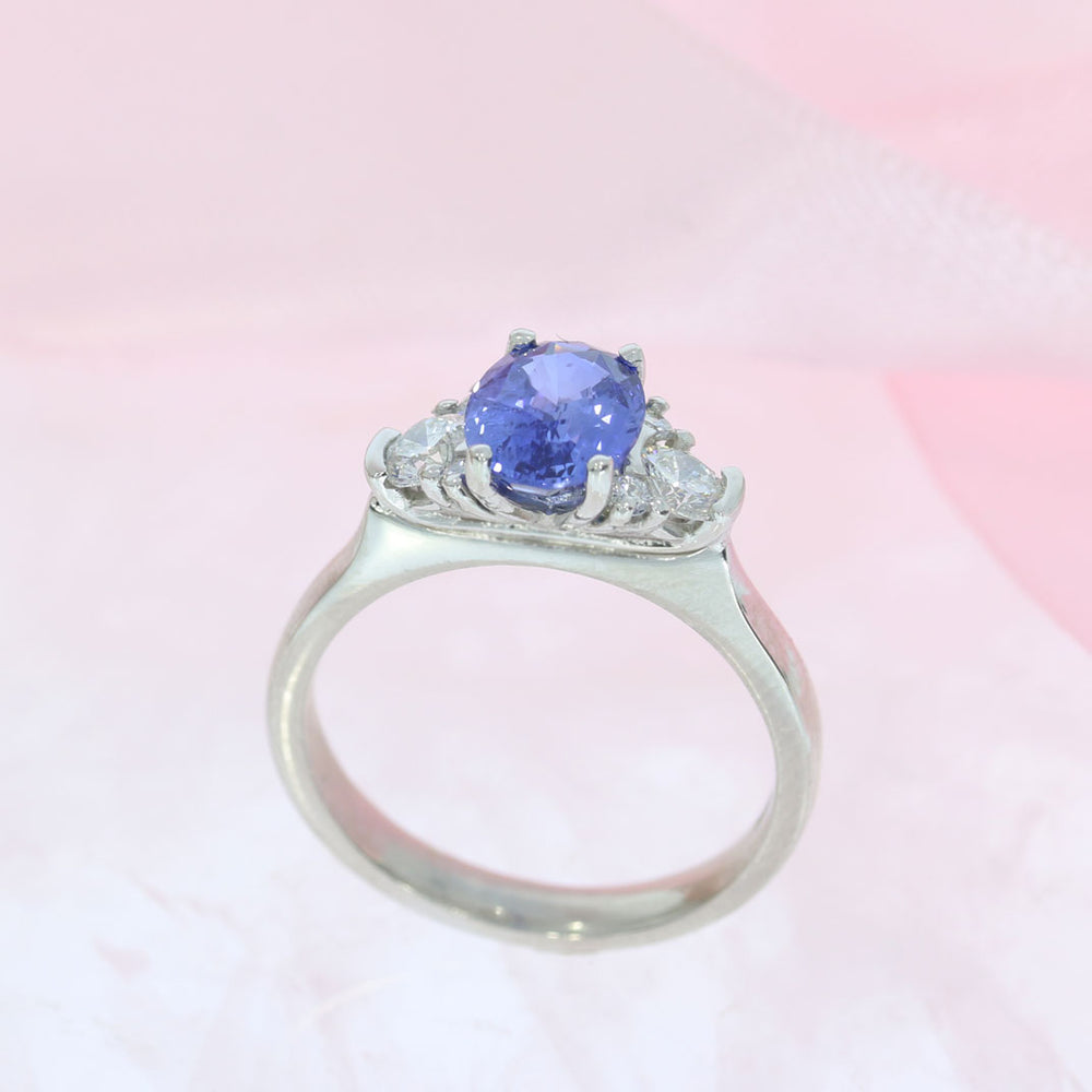 Platinum Oval Sapphire & Diamond Claw Set Ring Sapphire: 1.60ct Diamond: 0.38ct