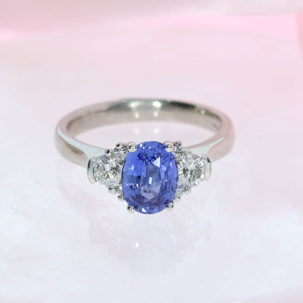 Platinum Oval Sapphire & Diamond Claw Set Ring Sapphire: 1.60ct Diamond: 0.38ct