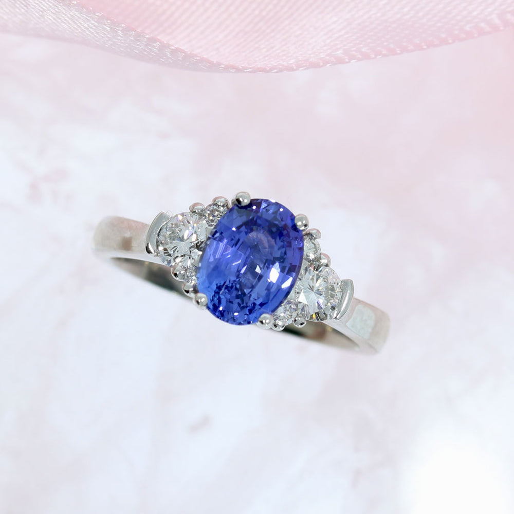 Platinum Oval Sapphire & Diamond Claw Set Ring Sapphire: 1.60ct Diamond: 0.38ct
