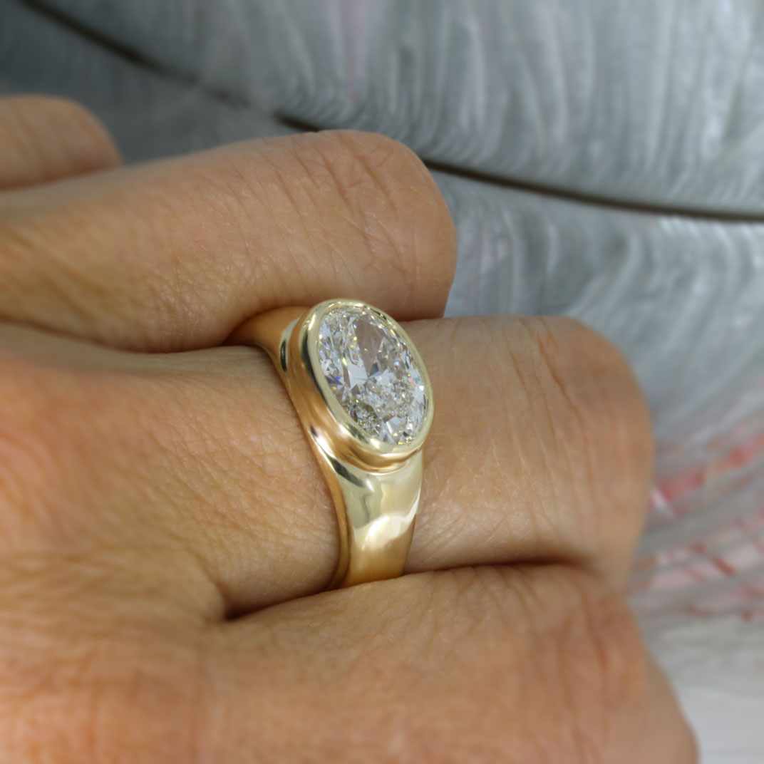 9ct Gold Certified Oval Lab Diamond Solitaire Ring in a Sideways Setting.