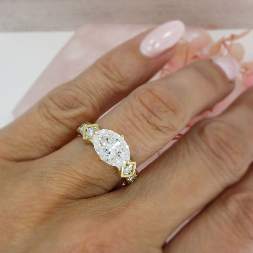 9ct Gold Certified Oval Lab Grown Diamond Solitaire Ring with Pave Set Shoulders.