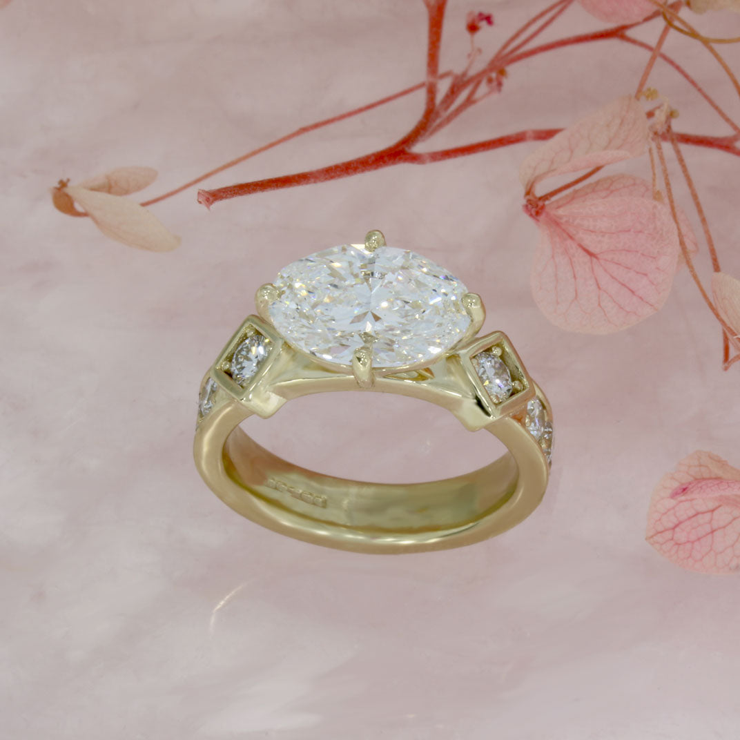 9ct Gold Certified Oval Lab Grown Diamond Solitaire Ring with Pave Set Shoulders.