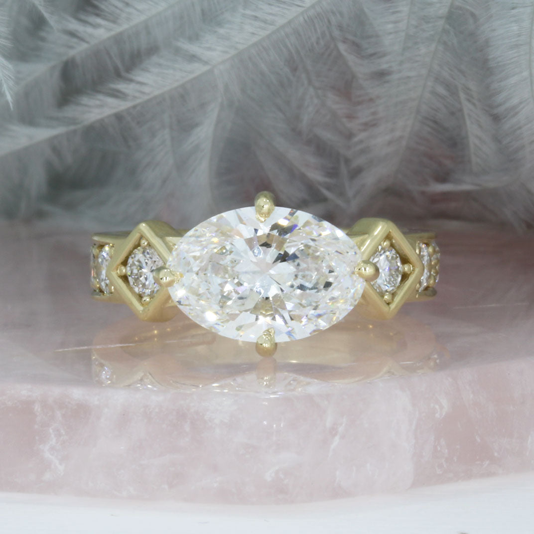 9ct Gold Certified Oval Lab Grown Diamond Solitaire Ring with Pave Set Shoulders.
