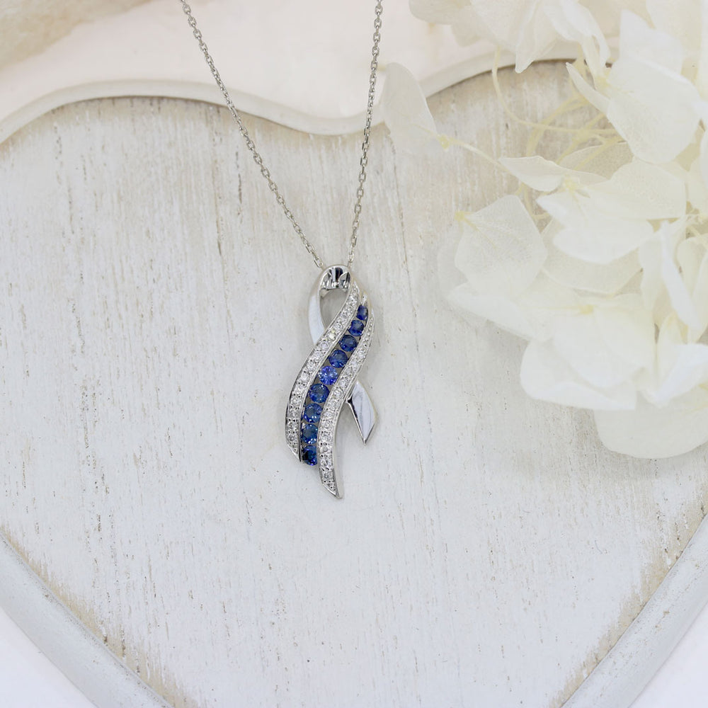 Pre Owned 18ct White Gold Sapphire & Diamond, Ribbon Style Pendant on a 16" chain