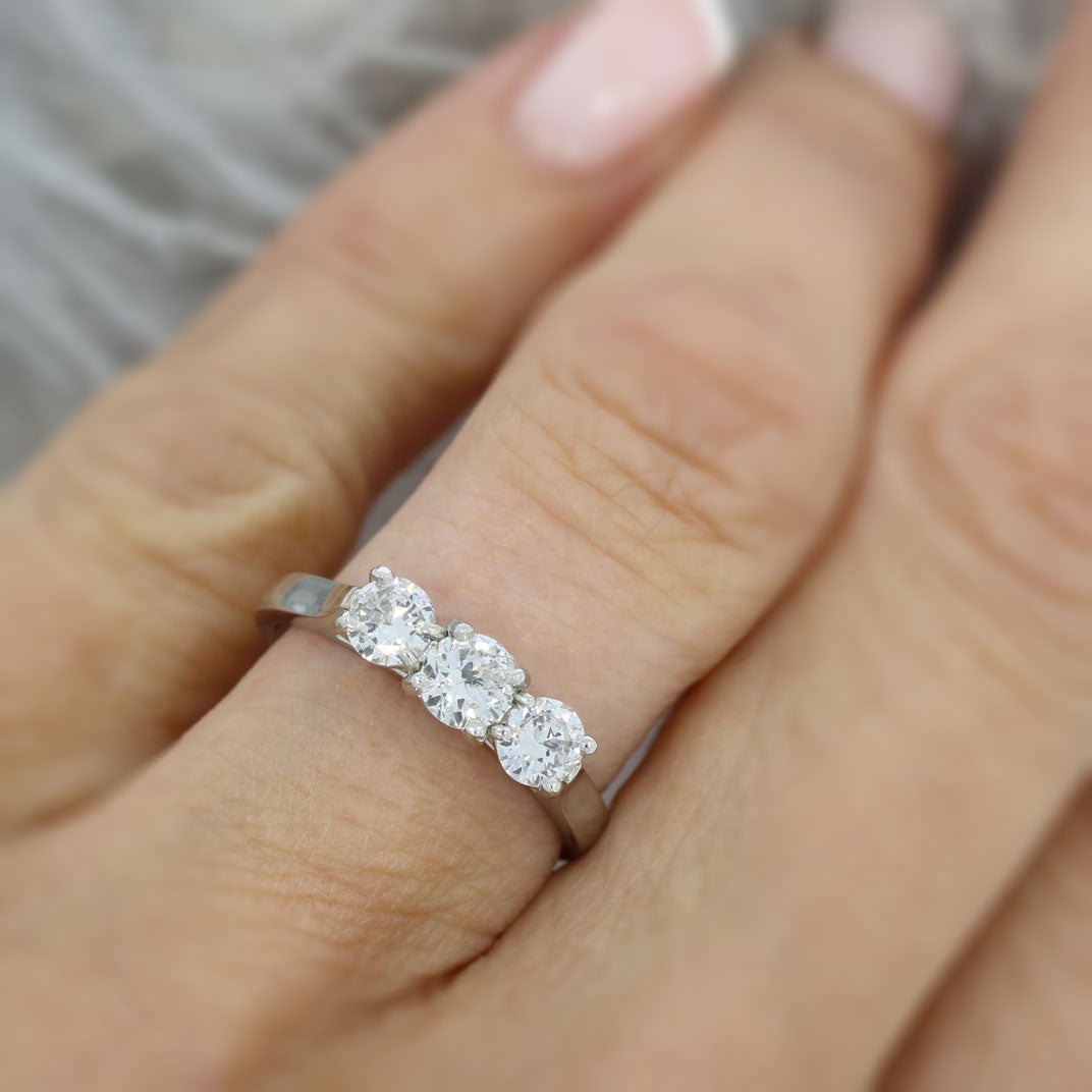 Pre Owned Platinum Claw Set Diamond 3 Stone Ring 0.88ct