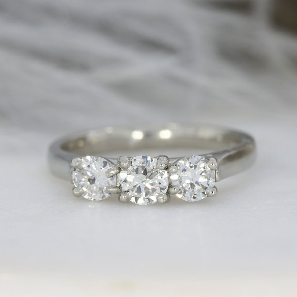 Pre Owned Platinum Claw Set Diamond 3 Stone Ring 0.88ct