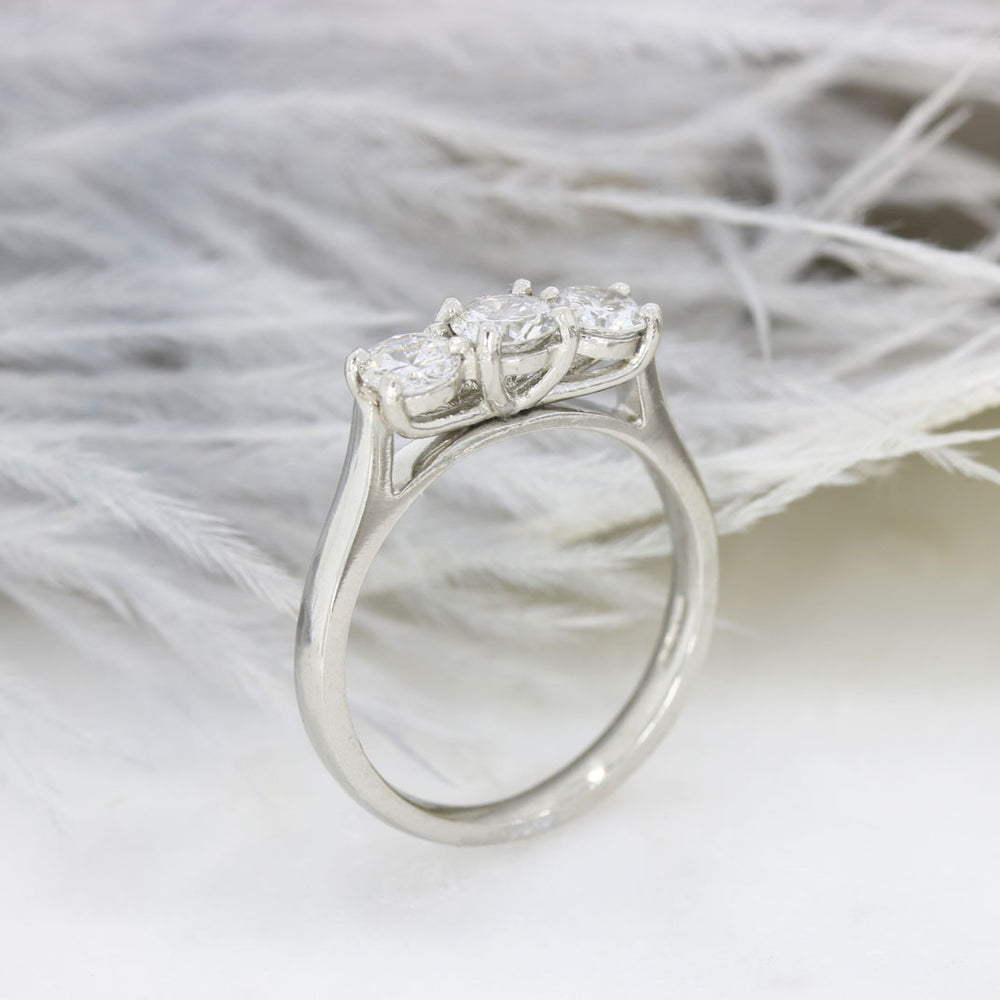 Pre Owned Platinum Claw Set Diamond 3 Stone Ring 0.88ct