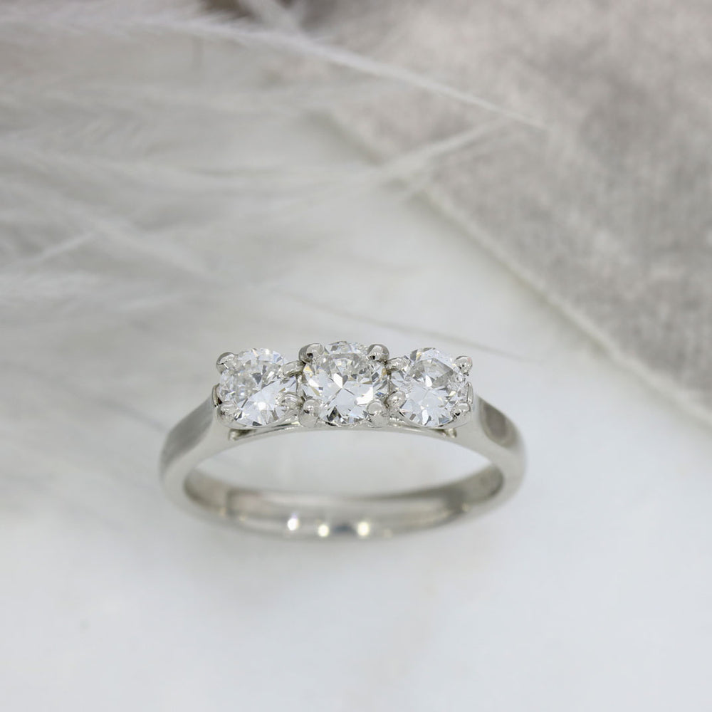Pre Owned Platinum Claw Set Diamond 3 Stone Ring 0.88ct