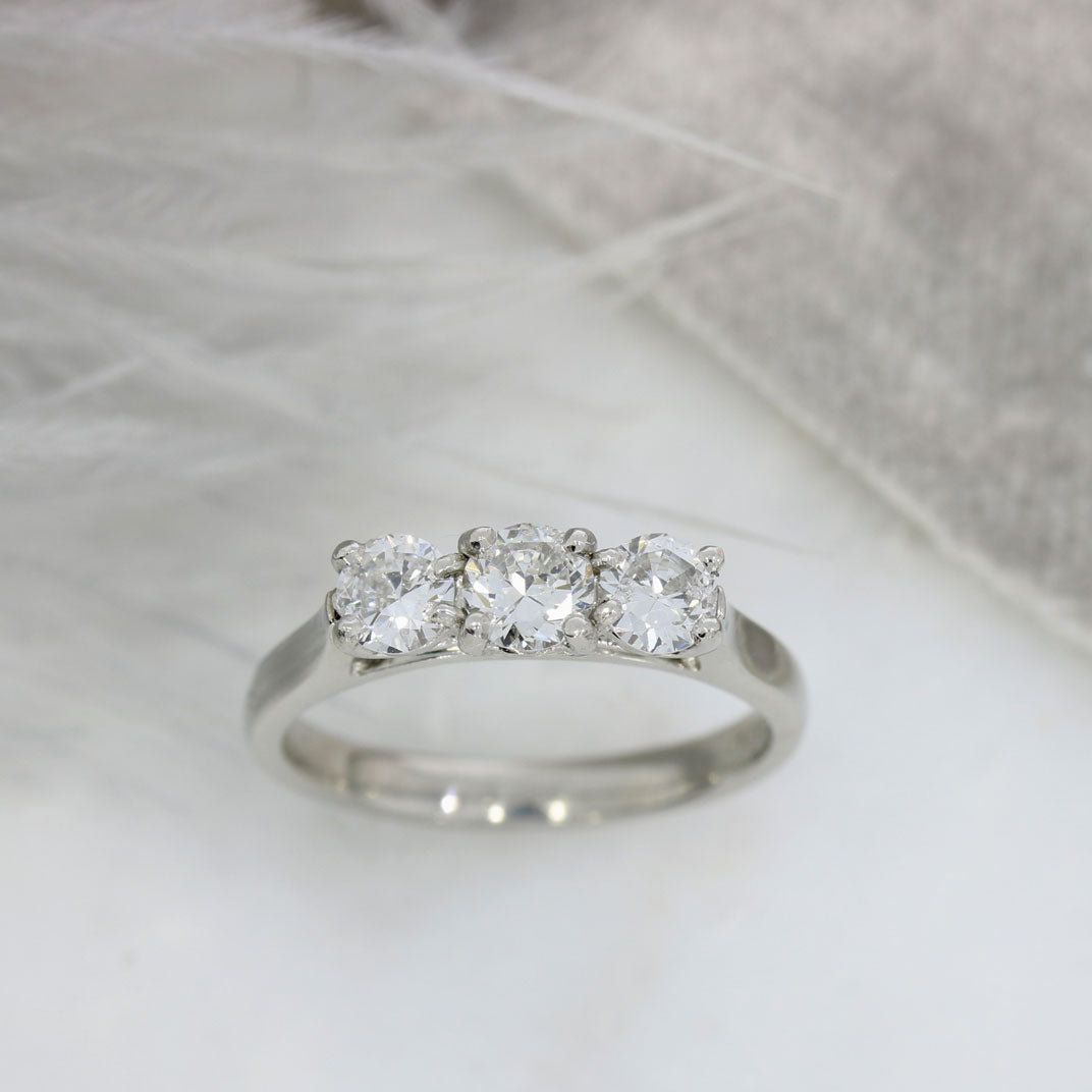 Pre Owned Platinum Claw Set Diamond 3 Stone Ring 0.88ct