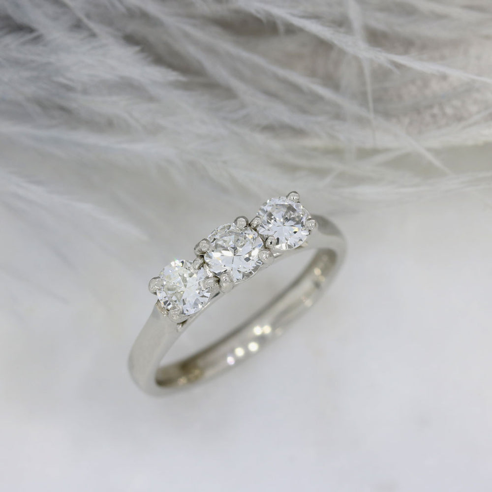 Pre Owned Platinum Claw Set Diamond 3 Stone Ring 0.88ct