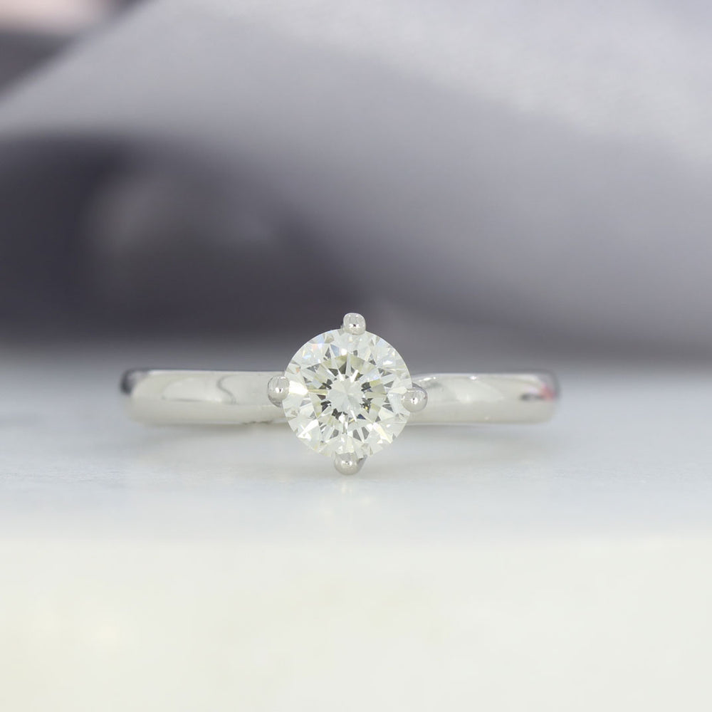 Pre Owned Platinum Compass Set Diamond Solitaire Ring 0.67ct J SI1