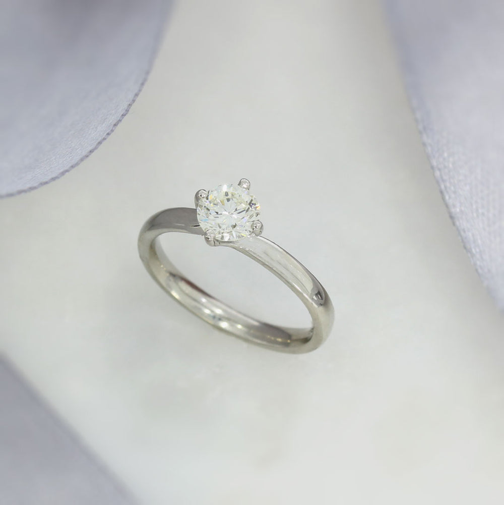 Pre Owned Platinum Compass Set Diamond Solitaire Ring 0.67ct J SI1