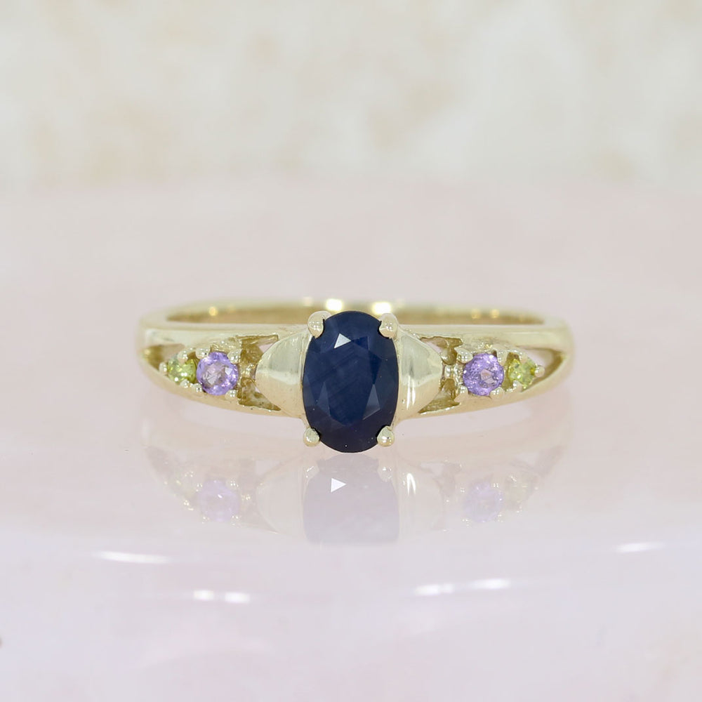 Pre Owned 9ct Yellow Gold Oval Sapphire Ring with Amethyst & Peridot Shoulders