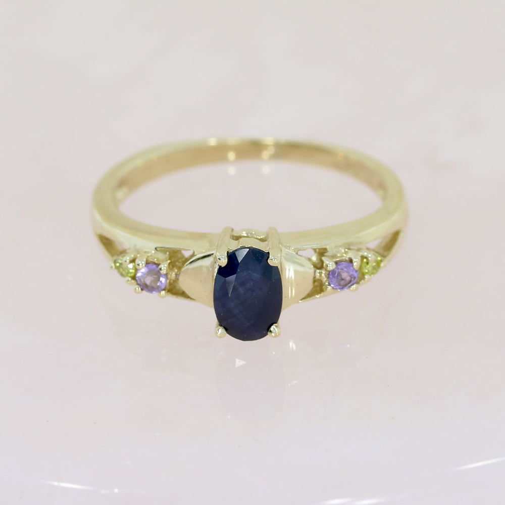 Pre Owned 9ct Yellow Gold Oval Sapphire Ring with Amethyst & Peridot Shoulders