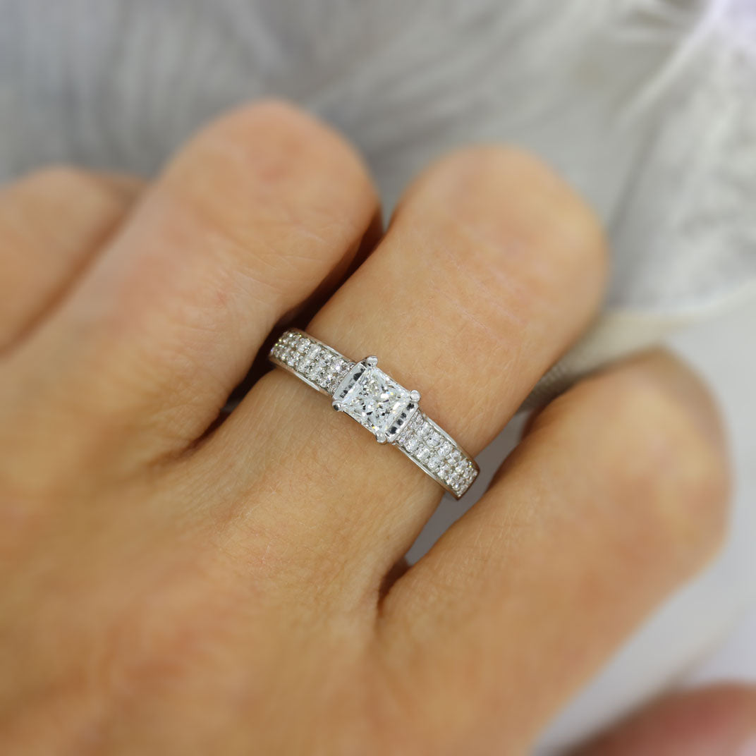 Pre Owned Platinum Princess Cut Diamond Solitaire Ring with Double Row Diamond Shoudlers