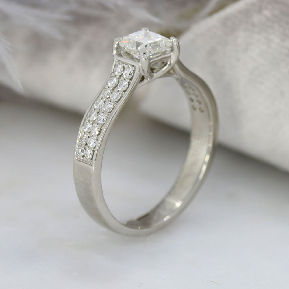 Pre Owned Platinum Princess Cut Diamond Solitaire Ring with Double Row Diamond Shoudlers